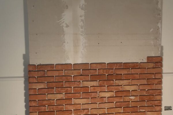 INSTALLATION OF BRICK SLIPS ON CHIMNEY BREAST